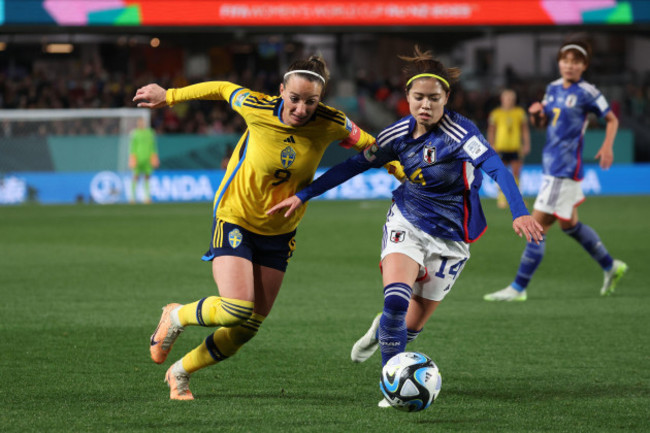 auckland-new-zealand-11th-aug-2023-yui-hasegawa-of-japan-and-kosovare-asllani-of-sweden-compete-for-the-ball-during-the-fifa-womens-world-cup-2023-quarter-final-soccer-match-between-japan-and-swe