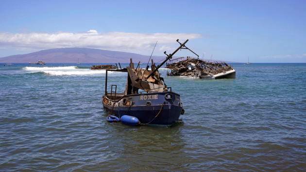 burnt-boats-sit-in-waters-off-of-lahaina-hawaii-on-friday-aug-11-2023-the-search-of-the-wildfire-wreckage-on-the-hawaiian-island-of-maui-revealed-a-wasteland-of-burned-out-homes-and-obliterated