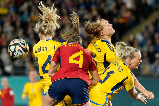 swedens-nathalie-bjorn-spains-irene-paredes-swedens-magdalena-eriksson-and-swedens-stina-blackstenius-from-left-challenge-for-the-ball-during-the-womens-world-cup-semifinal-soccer-match-betwe
