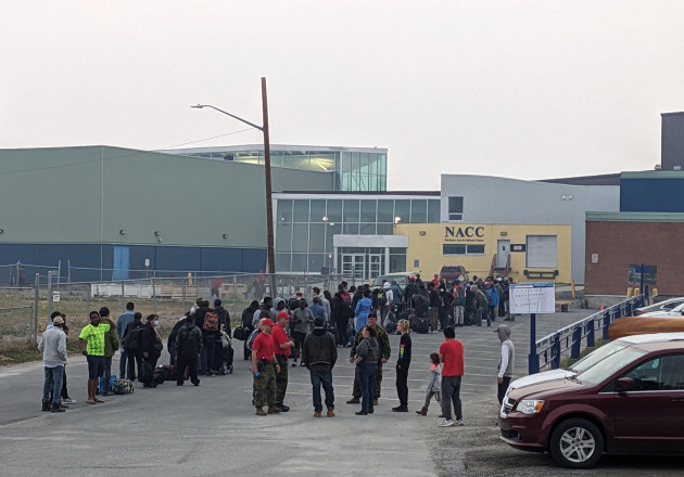 yellowknife-canada-17th-aug-2023-people-without-vehicles-lineup-to-register-for-a-flight-to-calgary-alberta-in-yellowknife-on-thursday-august-17-2023-prime-minister-justin-trudeau-is-expected