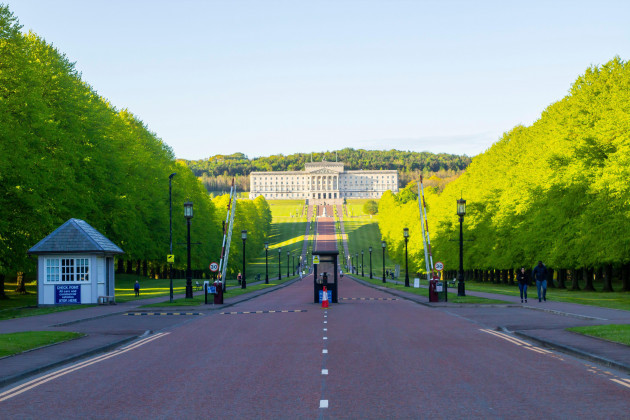 16-may-2021-visitors-walking-the-long-tree-lined-avenue-to-the-stormont-parliament-building-of-northern-ireland-located-on-the-stormont-estate-in-east