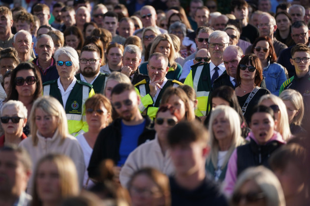 members-of-the-national-ambulance-service-attend-a-vigil-in-kickham-plaza-co-tipperary-in-memory-of-luke-mcsweeney-24-his-18-year-old-sister-grace-mcsweeney-zoey-coffey-and-nicole-murphy-both-al
