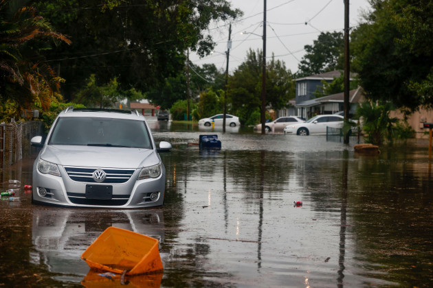 tampa-florida-usa-30th-aug-2023-a-vehicle-sits-on-flooded-thrace-street-at-palmetto-beach-in-tampa-as-hurricane-idalia-approaches-the-big-bend-region-on-wednesday-august-30-2023-credit-image