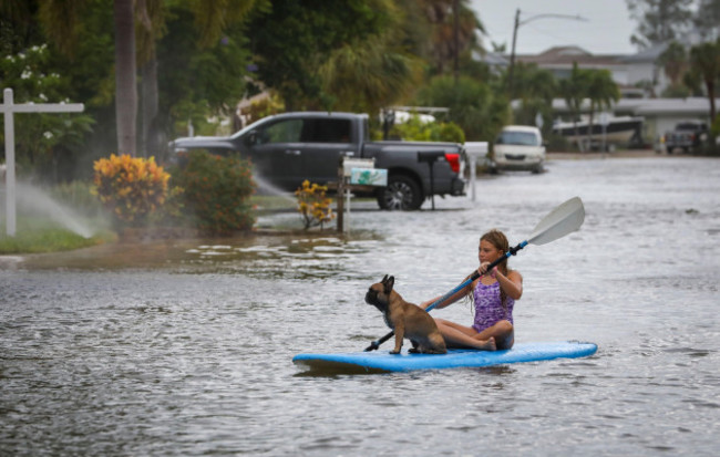 lily-gumos-11-of-st-pete-beach-kayaks-with-her-french-bulldog-along-blind-pass-road-and-86th-avenue-wednesday-aug-30-2023-in-st-pete-beach-fla-hurricane-idalia-made-landfall-wednesday-in-flo