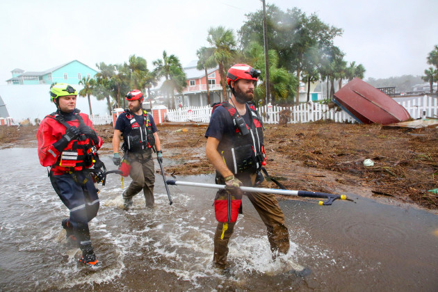 steinhatchee-florida-usa-30th-aug-2023-rescue-workers-with-tidewater-disaster-response-from-left-zack-hoeth-zack-mccue-and-mike-foster-of-fairfax-va-search-sw-358-hwy-for-people-in-need-o