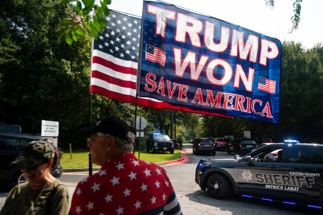 usa-24th-aug-2023-supporters-of-former-president-donald-trump-congregate-outside-the-fulton-county-jail-on-the-day-mr-trump-is-expected-to-surrender-to-authorities-after-being-indicted-over-his-at