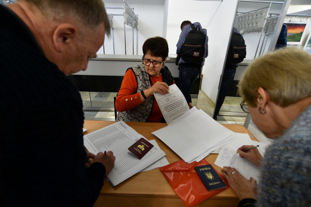 people-from-luhansk-and-donetsk-regions-the-territory-controlled-by-a-pro-russia-separatist-governments-who-live-in-crimea-get-their-ballots-to-vote-in-a-referendum-in-sevastopol-crimea-friday-s
