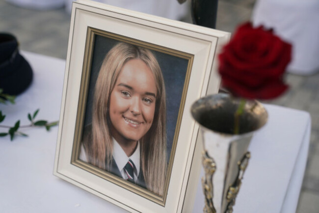 a-picture-of-nicole-murphy-on-display-as-people-light-candles-at-the-end-of-the-vigil-in-kickham-plaza-co-tipperary-in-memory-of-luke-mcsweeney-24-his-18-year-old-sister-grace-mcsweeney-zoey-coff
