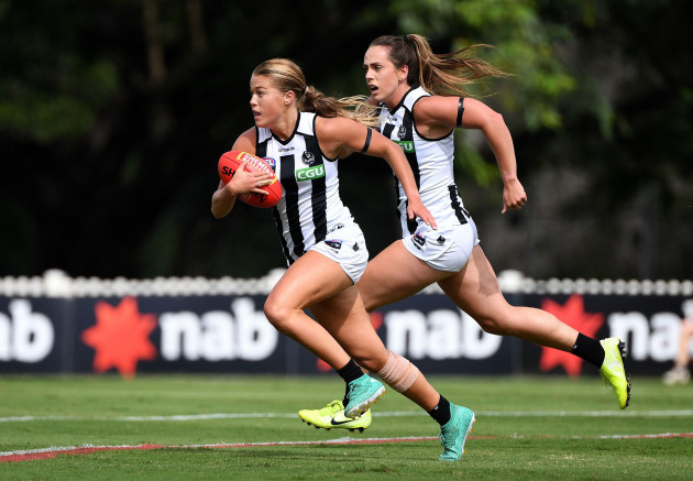 sarah-rowe-of-the-magpies-left-and-teammate-aishling-sheridan-in-action-during-the-round-6-aflw-match-between-the-brisbane-lions-and-collingwood-magpies-at-hickey-park-in-brisbane-saturday-march-1
