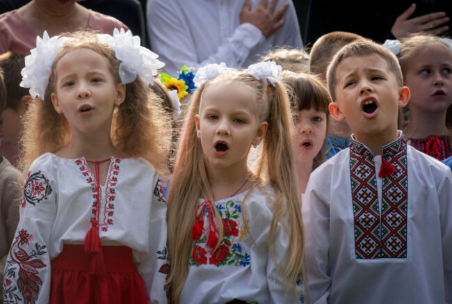 school-children-sing-ukraines-national-anthem-as-they-attend-a-ceremony-of-the-first-day-in-school-in-bucha-ukraine-friday-sept-1-2023-ukraine-marks-sept-1-as-knowledge-day-as-a-traditional-l