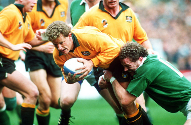 michael-lynagh-is-tackled-by-philip-matthews