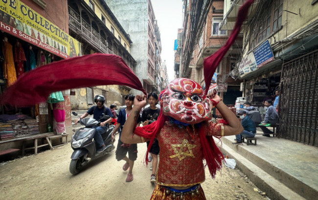 kathmandu-bagmati-nepal-1st-sep-2023-a-masked-dancer-performs-in-celebration-of-the-gaijatra-festival-or-festival-of-cows-in-kathmandu-hindus-celebrate-the-festival-to-honor-cows-and-commemora