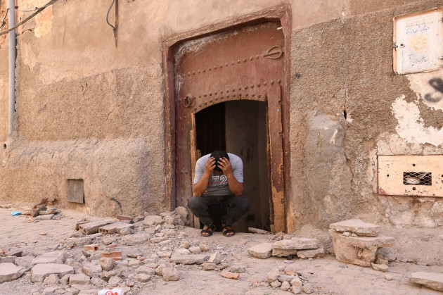 marrakesh-morocco-9th-sep-2023-a-man-is-seen-outside-his-damaged-house-after-a-6-8-magnitude-earthquake-in-marrakesh-morocco-sept-9-2023-the-death-toll-from-a-strong-earthquake-that-struck-mo