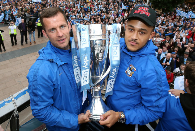 coventry-citys-michael-doyle-left-and-jodi-jones-with-the-trophy-during-the-sky-bet-league-two-promotion-parade-in-coventry-press-association-photo-picture-date-wednesday-may-30-2018-see-pa-sto