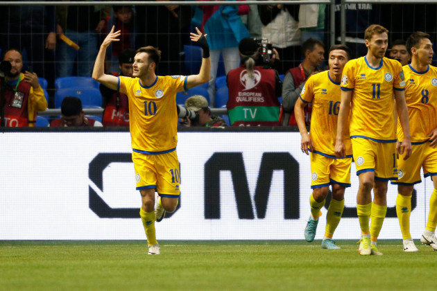 kazakhstans-maxim-samorodov-left-celebrates-after-scoring-his-sides-first-goal-during-the-euro-2024-group-h-qualifying-soccer-match-between-kazakhstan-and-northern-ireland-at-the-astana-arena-in-a