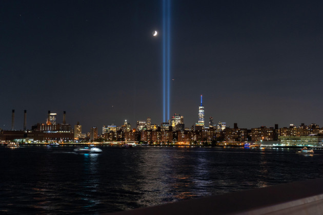 new-york-ny-september-11-lower-manhattan-skyline-is-seen-from-long-island-city-with-tribute-of-light-on-20th-anniversary-of-terror-attack-on-september-11-2021-in-new-york-city-the-twin-lights-r