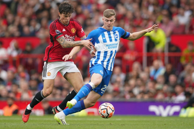 manchester-uniteds-victor-lindelof-left-challenges-brightons-evan-ferguson-during-the-english-premier-league-soccer-match-between-manchester-united-and-brighton-and-hove-albion-at-old-trafford-sta