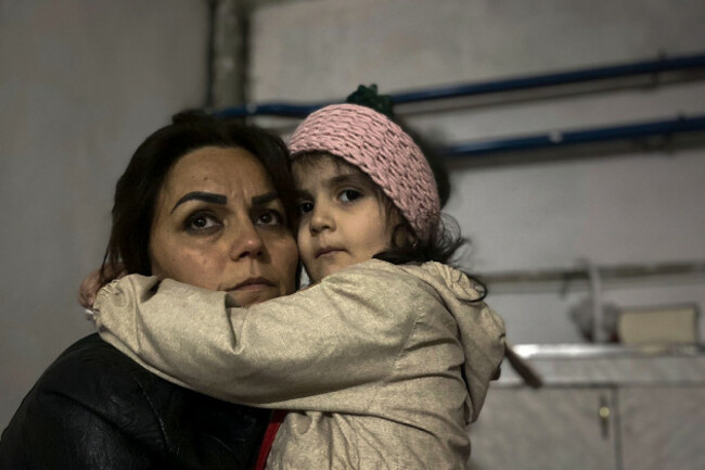 a-girl-embraces-her-relative-sitting-in-a-shelter-during-shelling-in-stepanakert-nagorno-karabakh-azerbaijan-on-tuesday-sept-19-2023-declared-that-it-started-what-it-called-an-anti-terrorist-op