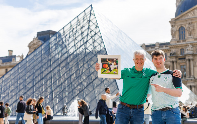 conor-and-fintan-larkin-with-a-picture-of-jonathan-sexton-breaking-the-record-points-for-an-irish-player-outside-the-louvre