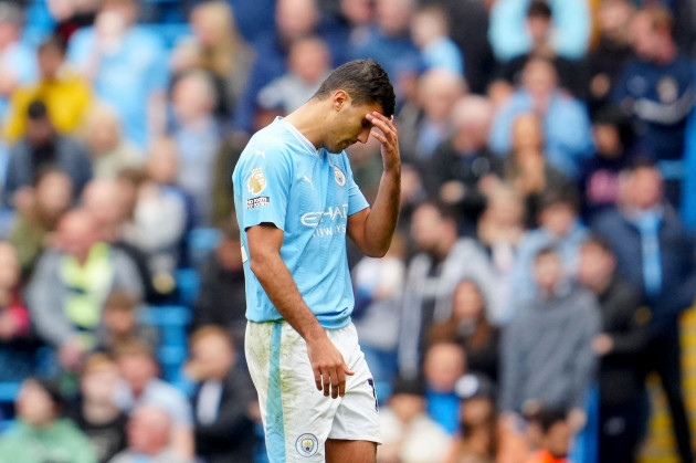 manchester-citys-rodrigo-walks-off-the-pitch-after-being-shown-a-red-card-during-the-english-premier-league-soccer-match-between-manchester-city-and-nottingham-forest-at-etihad-stadium-in-manchester