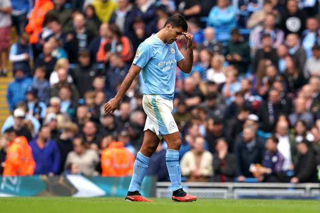 manchester-citys-rodri-looks-dejected-after-being-shown-a-red-card-for-violent-conduct-during-the-premier-league-match-at-the-etihad-stadium-manchester-picture-date-saturday-september-23-2023