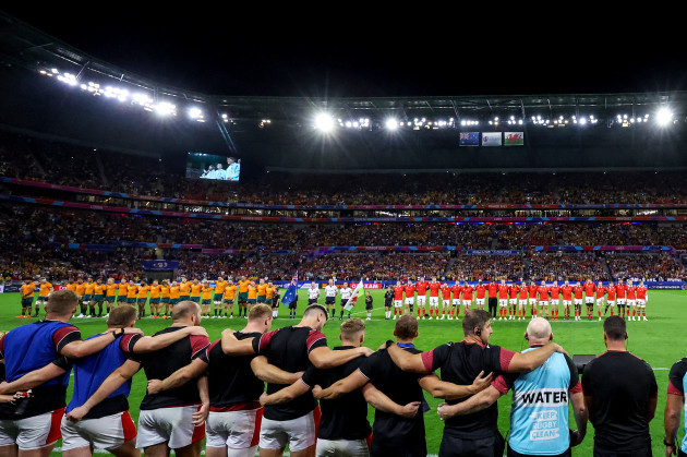 both-teams-stand-for-the-national-anthems