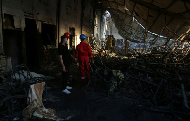 firefighters-work-at-the-site-of-a-fatal-fire-in-the-district-of-hamdaniya-nineveh-province-iraq-wednesday-sept-27-2023-a-fire-that-raced-through-a-hall-hosting-a-christian-wedding-in-northern