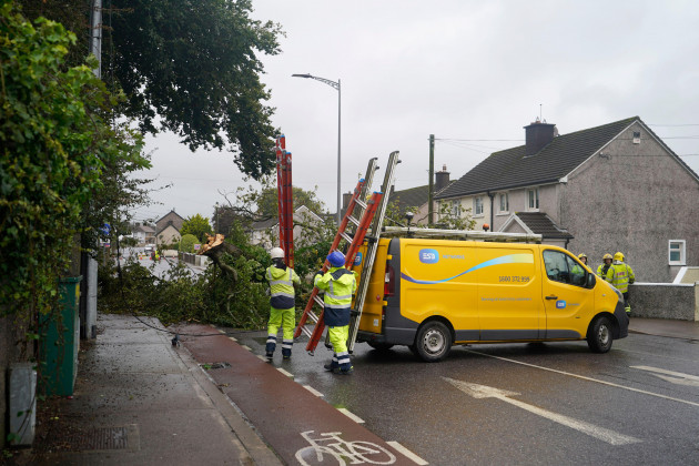 emergency-services-at-the-scene-of-a-fallen-tree-near-blackrock-in-cork-weather-warnings-will-come-into-force-as-the-uk-and-ireland-brace-for-the-arrival-of-storm-agnes-which-will-bring-damaging-win