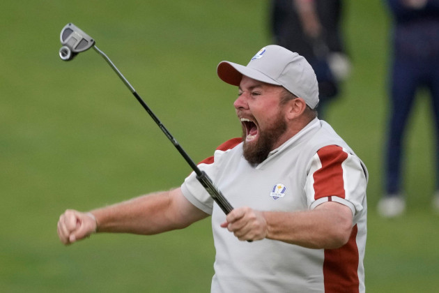 team-europes-shane-lowry-celebrates-on-the-18th-hole-after-makes-a-putt-and-winning-their-four-ball-match-the-ryder-cup-at-the-whistling-straits-golf-course-saturday-sept-25-2021-in-sheboygan-wi