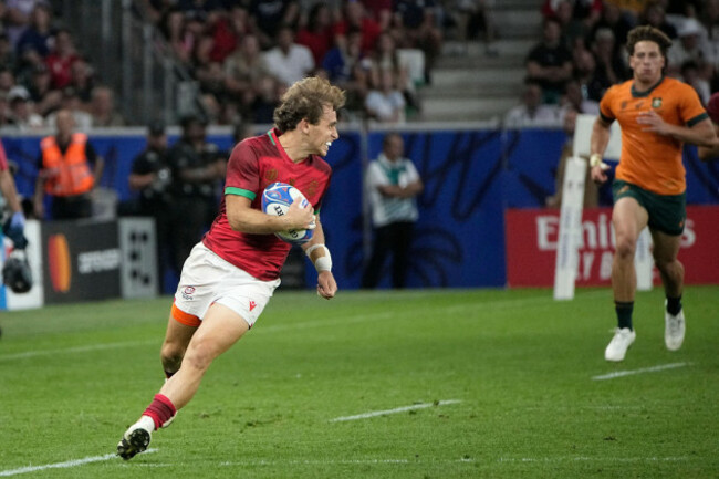 portugals-nuno-sousa-guedes-runs-with-the-ball-during-the-rugby-world-cup-pool-c-match-between-australia-and-portugal-at-the-stade-geoffroy-guichard-in-saint-etienne-france-sunday-oct-1-2023-a