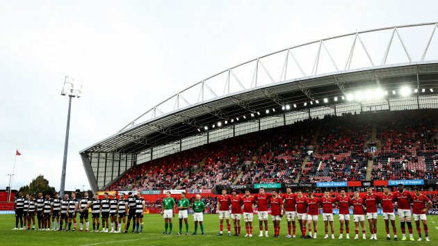 both-teams-stand-for-a-moments-silence-in-memory-of-greig-oliver