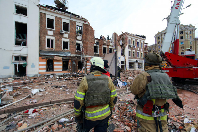 kharkiv-ukraine-06th-oct-2023-kharkiv-ukraine-october-06-2023-rescuers-are-seen-outside-the-building-destroyed-by-a-morning-russian-missile-attack-on-the-city-kharkiv-north-eastern-ukraine