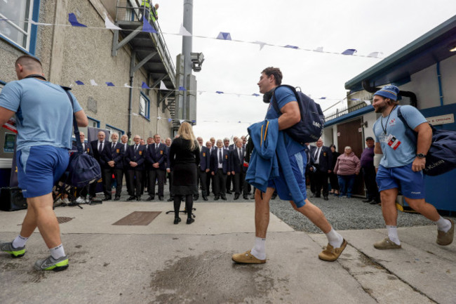 david-mccann-and-john-andrew-arrive-while-the-cavan-rugby-male-voice-choir-performs