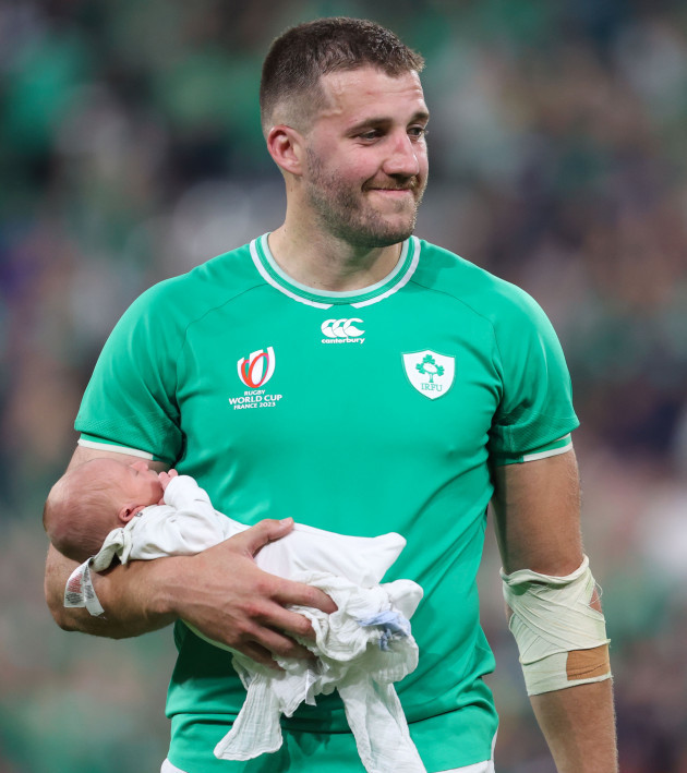 stuart-mccloskey-with-his-baby-after-the-game