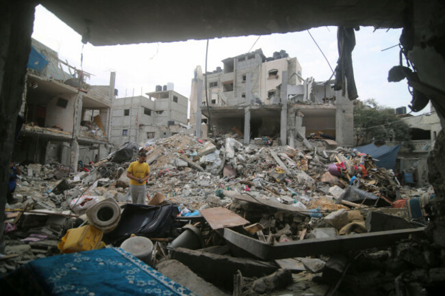 palestinians-inspect-the-rubble-abu-helal-family-in-rafah-refugee-camp-gaza-strip-monday-oct-9-2023-the-strike-killed-dozens-of-people-ap-photohatem-ali