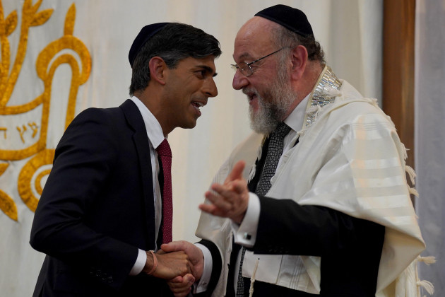 prime-minister-rishi-sunak-left-and-chief-rabbi-sir-ephraim-mirvis-attending-finchley-united-synagogue-in-central-london-for-victims-and-hostages-of-hamas-attacks-as-the-death-toll-rises-amid-ongo