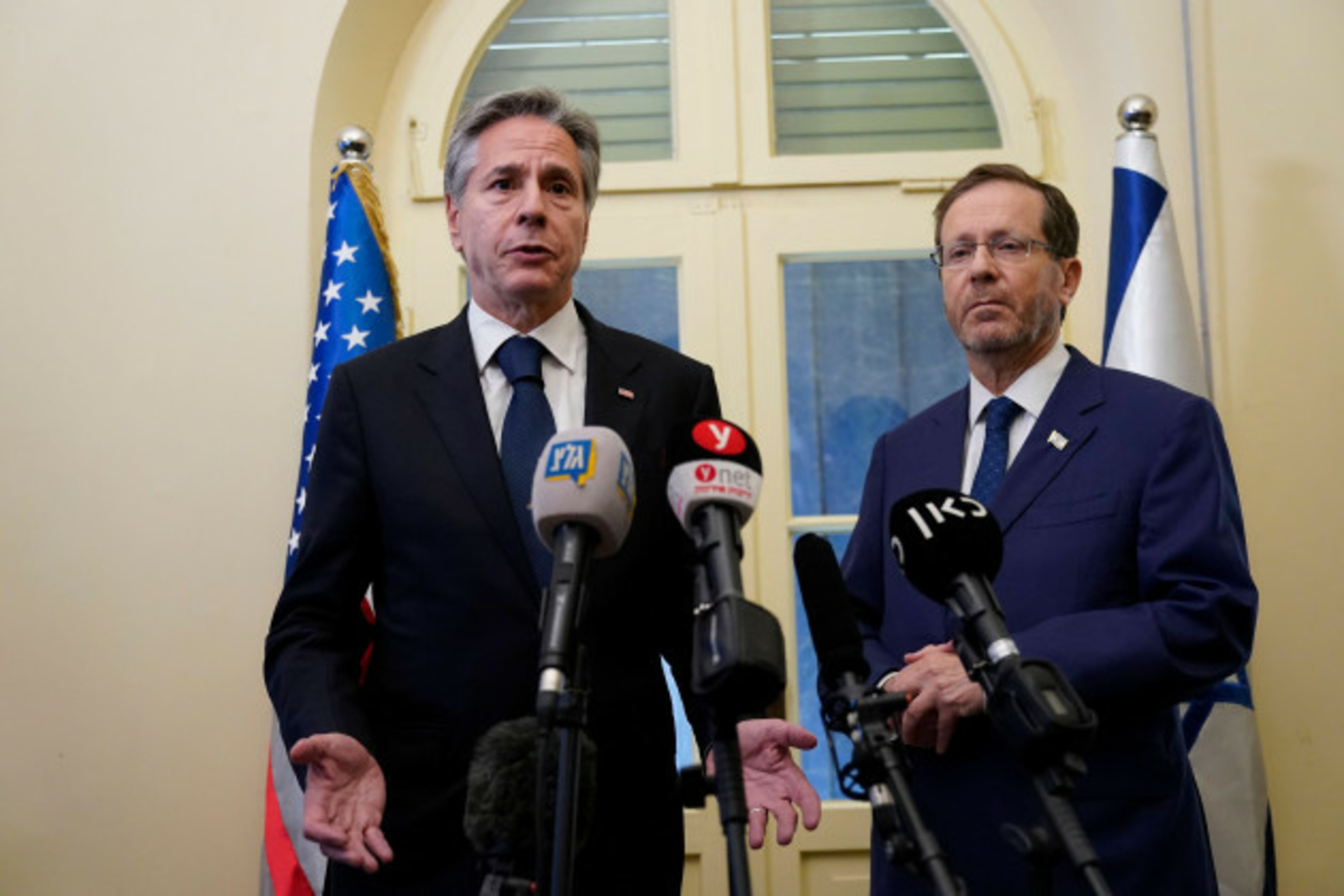 u-s-secretary-of-state-antony-blinken-left-and-israels-president-isaac-herzog-makes-statements-to-the-media-in-tel-aviv-thursday-oct-12-2023-president-joe-biden-is-dispatching-his-top-diplomat