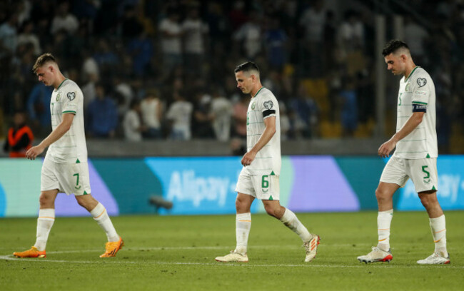 evan-ferguson-alan-browne-and-john-egan-dejected-after-the-game