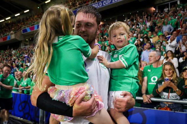 iain-henderson-celebrates-with-his-kids-after-the-game