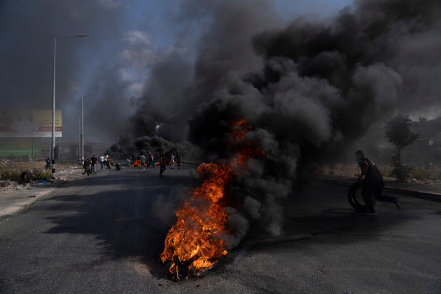 palestinian-demonstrators-clash-with-israeli-forces-following-a-demonstration-in-support-of-the-gaza-strip-in-the-west-bank-city-of-ramallah-friday-oct-13-2023-tens-of-thousands-of-muslims-demon