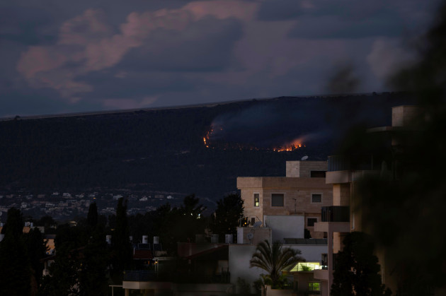 a-fire-burns-on-the-israeli-side-of-the-border-with-lebanon-following-explosions-sunday-oct-15-2023-ap-photopetros-giannakouris
