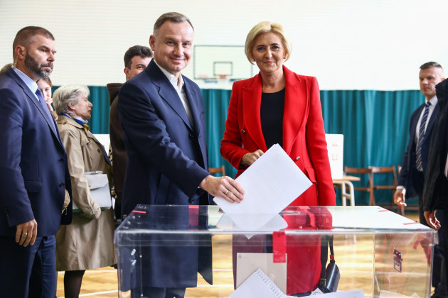 krakow-poland-15th-oct-2023-andrzej-duda-the-president-of-poland-and-his-wife-agata-kornhauser-duda-cast-their-ballots-at-a-polling-station-in-polish-parliamentary-elections-on-october-15-202