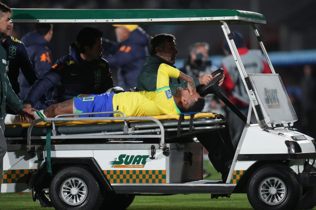 brazils-neymar-is-carried-off-the-pitch-on-a-stretcher-after-being-injured-during-a-qualifying-soccer-match-for-the-fifa-world-cup-2026-against-uruguay-at-centenario-stadium-in-montevideo-uruguay-t