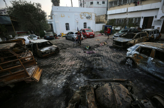 palestinians-check-the-place-of-the-explosion-at-al-ahli-hospital-in-gaza-city-wednesday-oct-18-2023-the-hamas-run-health-ministry-says-an-israeli-airstrike-caused-the-explosion-that-killed-hund