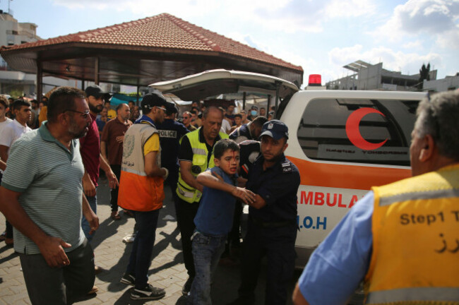 palestinian-medics-help-a-child-wounded-in-israeli-airstrikes-outside-the-shifa-hospital-in-gaza-city-gaza-strip-wednesday-oct-18-2023-ap-photoali-mahmoud