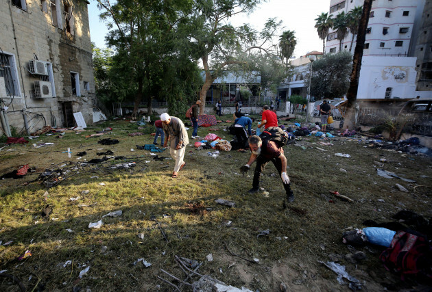 palestinians-check-the-site-of-a-deadly-explosion-in-al-ahli-hospital-in-gaza-city-wednesday-oct-18-2023-the-hamas-run-health-ministry-says-an-israeli-airstrike-caused-the-explosion-that-killed