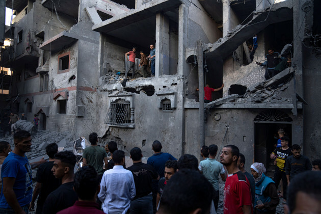 palestinians-evacuate-wounded-from-a-building-destroyed-in-israeli-bombardment-in-khan-younis-gaza-strip-thursday-oct-19-2023-ap-photofatima-shbair