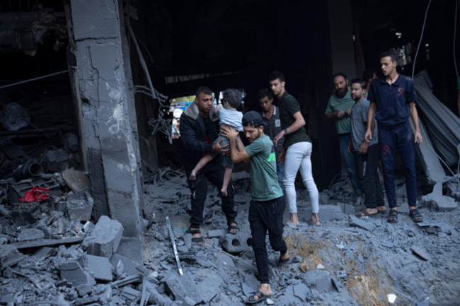 palestinians-evacuate-wounded-from-a-building-destroyed-in-israeli-bombardment-in-khan-younis-gaza-strip-thursday-oct-19-2023-ap-photofatima-shbair