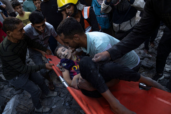 palestinians-evacuate-wounded-from-a-building-destroyed-in-israeli-bombardment-in-khan-younis-gaza-strip-thursday-oct-19-2023-ap-photofatima-shbair