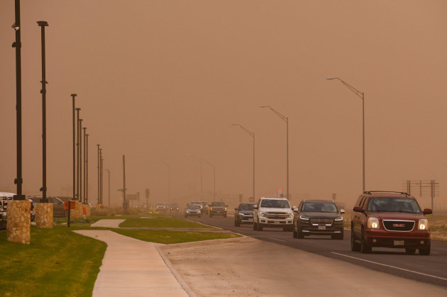 motorists-drive-into-an-oncoming-dust-storm-as-it-begins-to-blow-through-the-permian-basin-wednesday-june-8-2022-in-odessa-texas-eli-hartmanodessa-american-via-ap